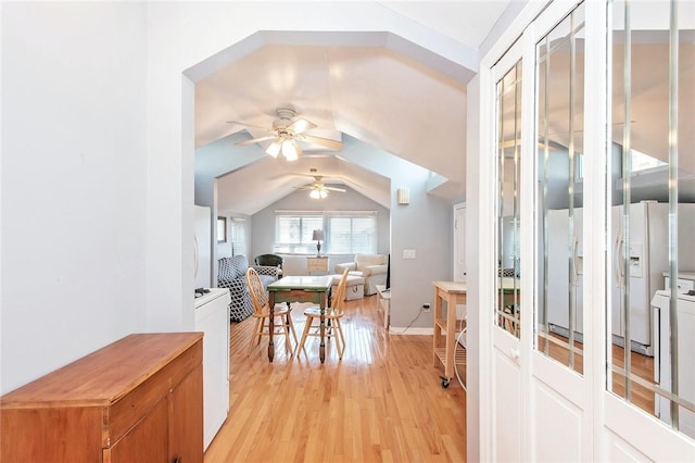 25B Edgewater Park Unit 25B, Bronx, NY 10465 - dining room featuring a ceiling fan, lofted ceiling, light wood-style floors, and baseboards