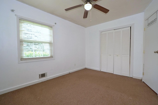 1578 N Thompson Dr, Bay Shore, NY 11706 - unfurnished bedroom featuring carpet flooring, a closet, and a ceiling fan