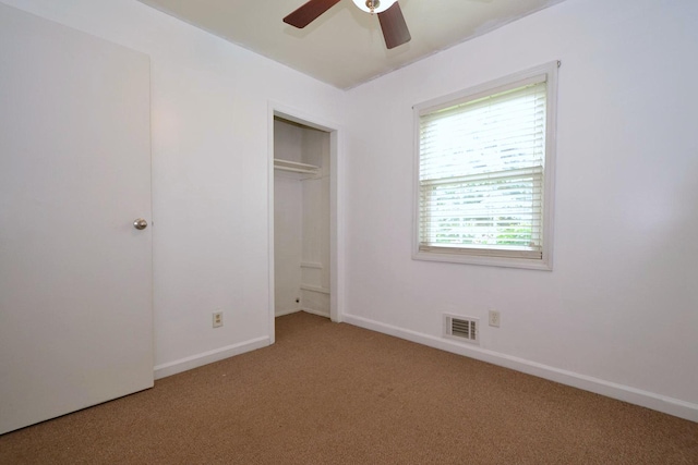 1578 N Thompson Dr, Bay Shore, NY 11706 - unfurnished bedroom with carpet, ceiling fan, and a closet