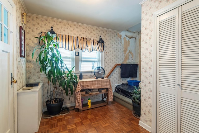 103 Fairfield Ave, Mineola, NY 11501 - bedroom featuring wallpapered walls, baseboards, a closet, and ornamental molding
