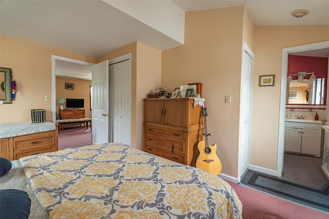 103 Fairfield Ave, Mineola, NY 11501 - bedroom with carpet floors, baseboards, and a sink