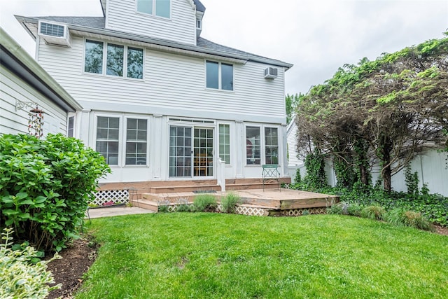 103 Fairfield Ave, Mineola, NY 11501 - back of house featuring a lawn and roof with shingles