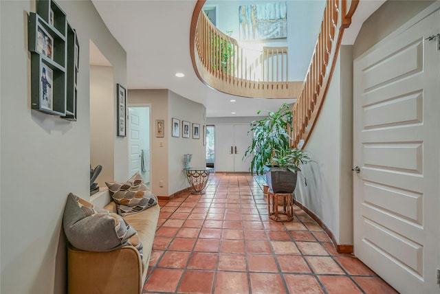 51 Eagle Chase, Woodbury, NY 11797 - entryway featuring stairs, baseboards, light tile patterned floors, and recessed lighting