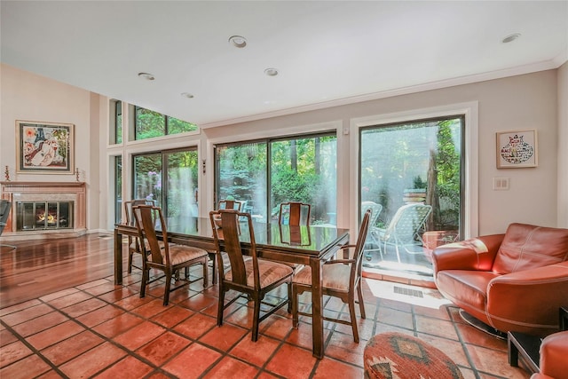 51 Eagle Chase, Woodbury, NY 11797 - dining room with crown molding, a fireplace, and recessed lighting