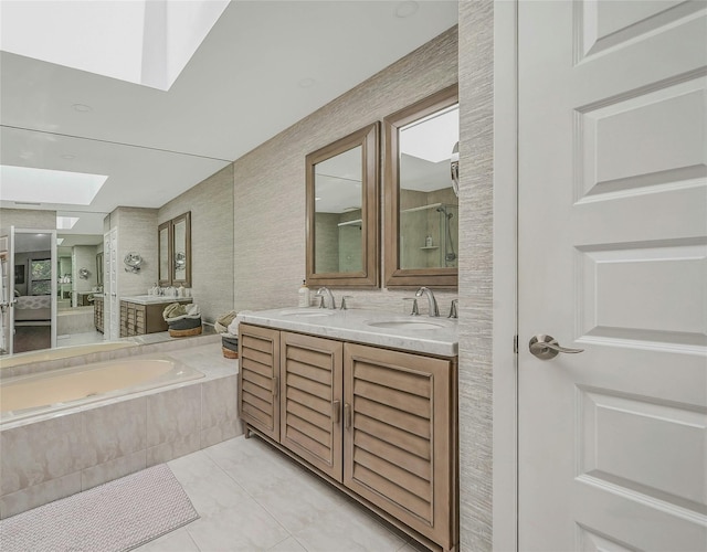51 Eagle Chase, Woodbury, NY 11797 - bathroom with a skylight, double vanity, a garden tub, and a shower