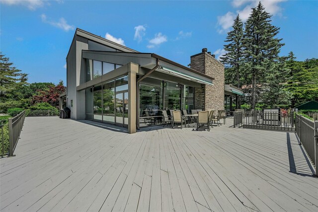 51 Eagle Chase, Woodbury, NY 11797 - wooden terrace featuring outdoor dining area