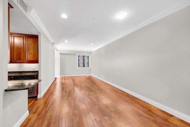 3816 Waldo Ave Unit 3C, Bronx, NY 10463 - unfurnished living room with crown molding, baseboards, hardwood / wood-style floors, and recessed lighting