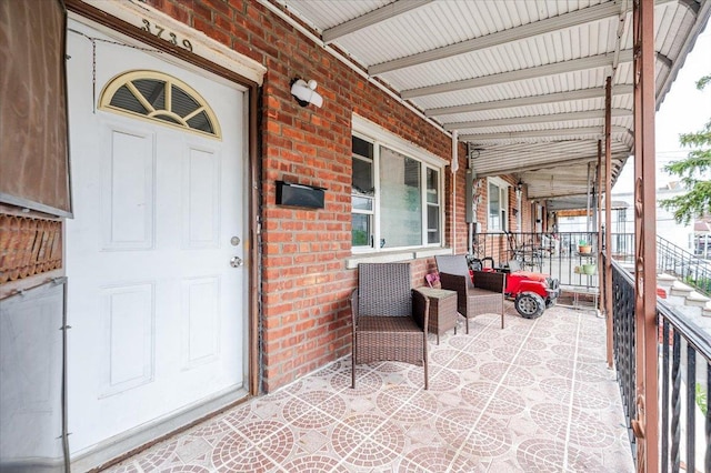 3739 Barnes Ave, Bronx, NY 10467 - property entrance featuring brick siding and covered porch