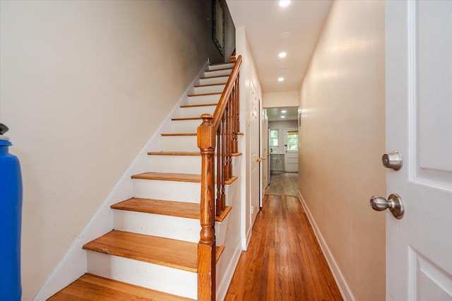 3739 Barnes Ave, Bronx, NY 10467 - staircase featuring wood finished floors, recessed lighting, and baseboards