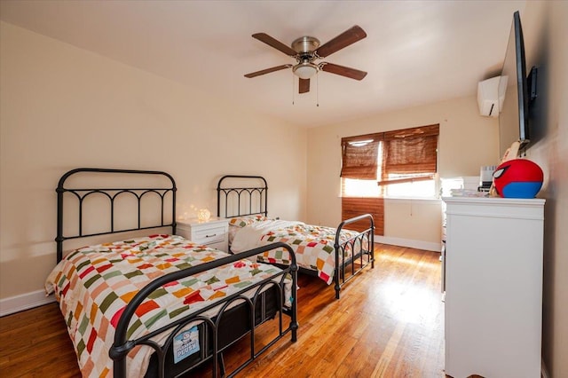 3739 Barnes Ave, Bronx, NY 10467 - bedroom featuring light wood finished floors, baseboards, and a ceiling fan