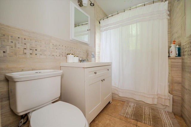 3739 Barnes Ave, Bronx, NY 10467 - bathroom with vanity, toilet, tile patterned floors, and shower / tub combo