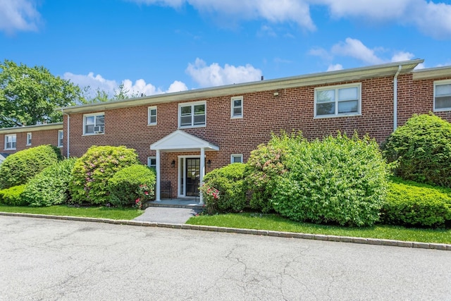 352 N State Rd Unit 2H, Briarcliff Manor, NY 10510 - view of front of house featuring brick siding