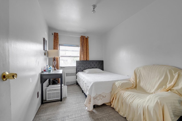 23-19 93rd St, East Elmhurst, NY 11369 - carpeted bedroom with radiator heating unit