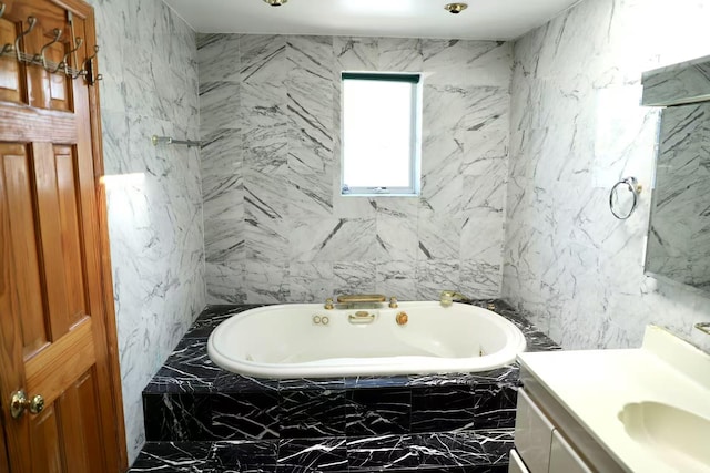 215-48 24th Ave, Bayside, NY 11360 - full bathroom featuring vanity, tiled tub, marble finish flooring, and tile walls