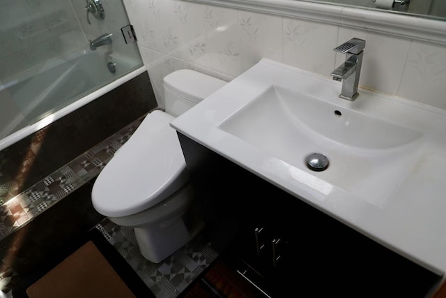 215-48 24th Ave, Bayside, NY 11360 - bathroom with toilet, shower / tub combination, vanity, and wallpapered walls