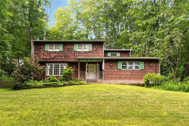 8 Margaret Dr, Hopewell Junction, NY 12533 - view of front of house featuring a front yard and covered porch
