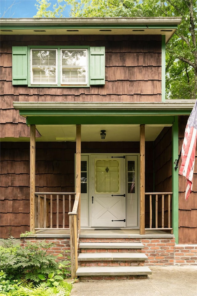 8 Margaret Dr, Hopewell Junction, NY 12533 - view of exterior entry featuring covered porch