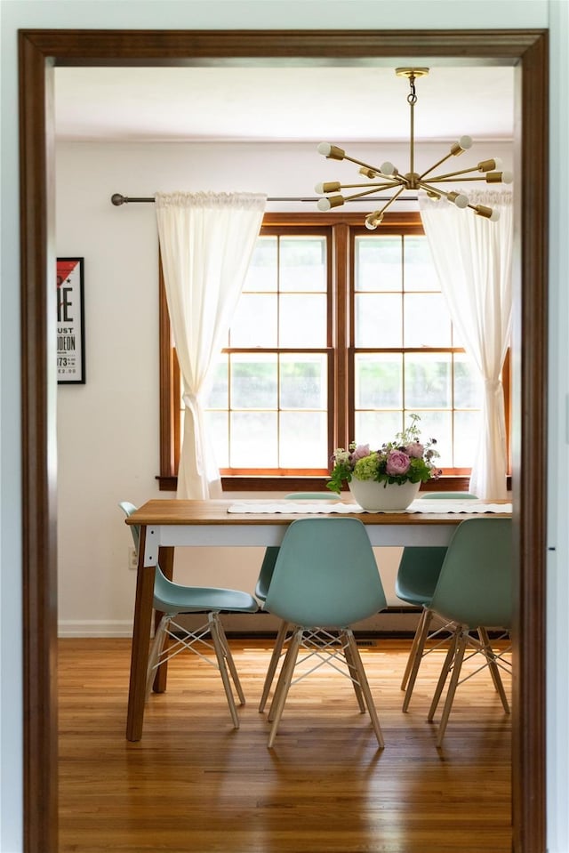8 Margaret Dr, Hopewell Junction, NY 12533 - dining space with a chandelier, wood finished floors, baseboards, and an office area