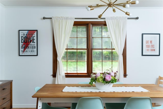 8 Margaret Dr, Hopewell Junction, NY 12533 - dining room featuring a chandelier, plenty of natural light, and ornamental molding