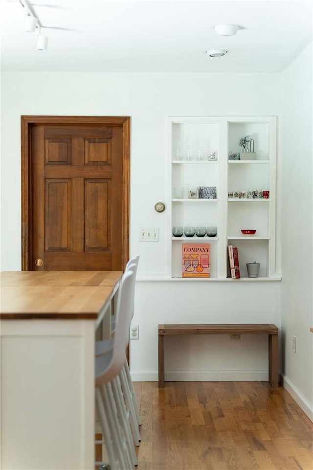 8 Margaret Dr, Hopewell Junction, NY 12533 - office area featuring wood finished floors, baseboards, and track lighting