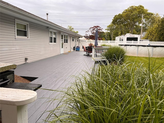 2 Merritt Ln, Center Moriches, NY 11934 - view of patio / terrace with a wooden deck