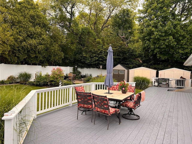 2 Merritt Ln, Center Moriches, NY 11934 - wooden terrace with outdoor dining area