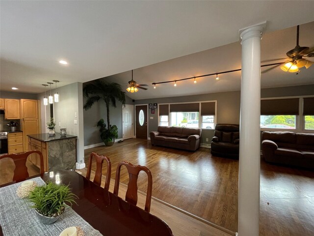 2 Merritt Ln, Center Moriches, NY 11934 - dining space featuring decorative columns, ceiling fan, wood finished floors, and recessed lighting