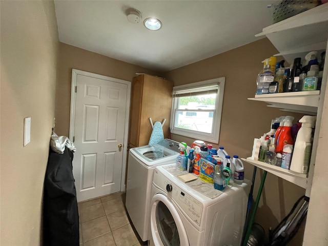 2 Merritt Ln, Center Moriches, NY 11934 - laundry room with washer and clothes dryer and light tile patterned flooring