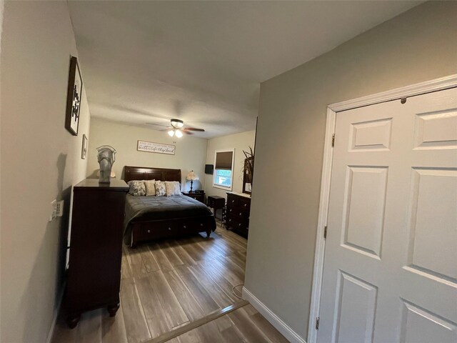 2 Merritt Ln, Center Moriches, NY 11934 - bedroom featuring wood finished floors, baseboards, and a ceiling fan