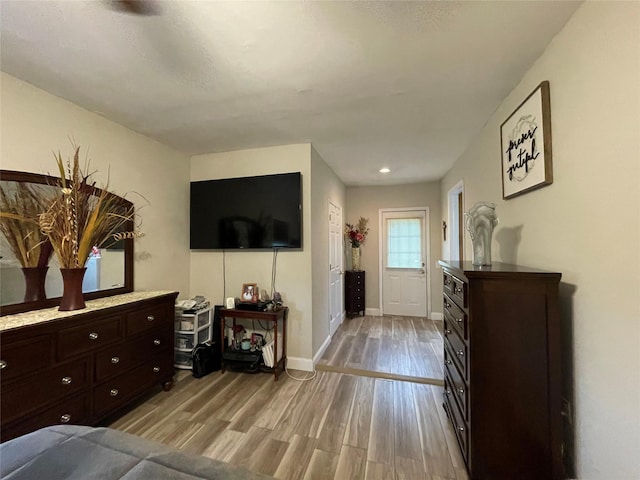 2 Merritt Ln, Center Moriches, NY 11934 - living room with light wood finished floors and baseboards