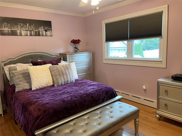 2 Merritt Ln, Center Moriches, NY 11934 - bedroom featuring baseboard heating, wood finished floors, and crown molding