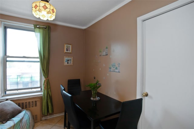 83-37 Saint James Ave Unit 2R, Elmhurst, NY 11373 - dining room with radiator heating unit, plenty of natural light, and light tile patterned floors