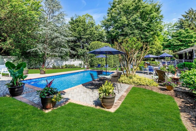 7 Woods Rd, Locust Valley, NY 11560 - view of swimming pool with a patio
