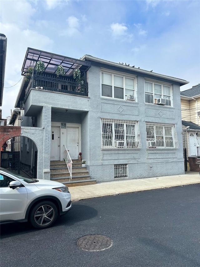 21 Brighton 10th Path, Brooklyn, NY 11235 - view of front of house with a balcony and cooling unit