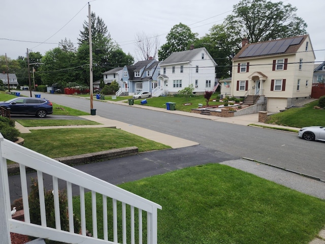 30 Royce Ave, Middletown, NY 10940 - view of green lawn with a residential view and an attached garage