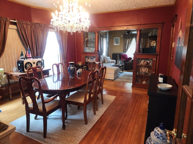 30 Royce Ave, Middletown, NY 10940 - dining area featuring crown molding, hardwood / wood-style flooring, a chandelier, ceiling fan, and a textured ceiling