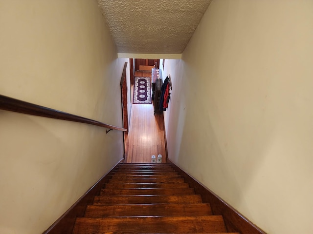 30 Royce Ave, Middletown, NY 10940 - staircase featuring a textured ceiling and wood-type flooring