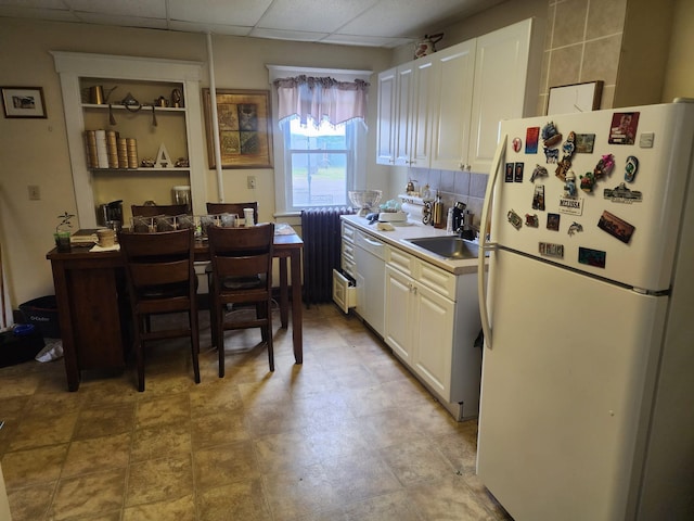 30 Royce Ave, Middletown, NY 10940 - kitchen featuring white appliances, white cabinets, a sink, a drop ceiling, and light countertops