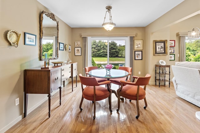 8 Lakeview Ct, Riverhead, NY 11901 - dining area featuring light wood-style floors and baseboards