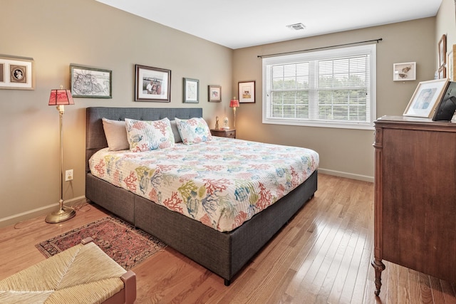 8 Lakeview Ct, Riverhead, NY 11901 - bedroom featuring wood finished floors and baseboards