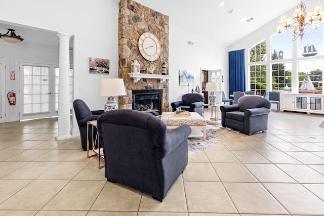 8 Lakeview Ct, Riverhead, NY 11901 - living area with light tile patterned floors, high vaulted ceiling, a fireplace, ornate columns, and a chandelier