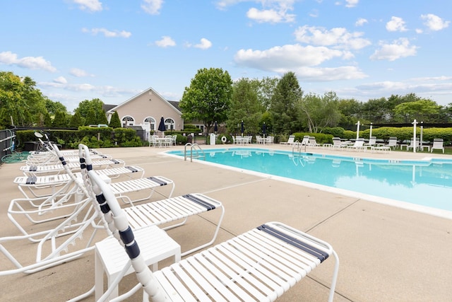 8 Lakeview Ct, Riverhead, NY 11901 - community pool with a patio area and view of scattered trees