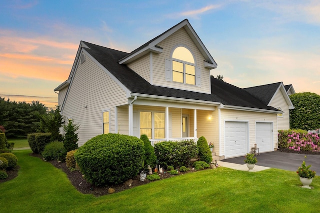 8 Lakeview Ct, Riverhead, NY 11901 - traditional-style home with an attached garage, a front yard, asphalt driveway, and a porch