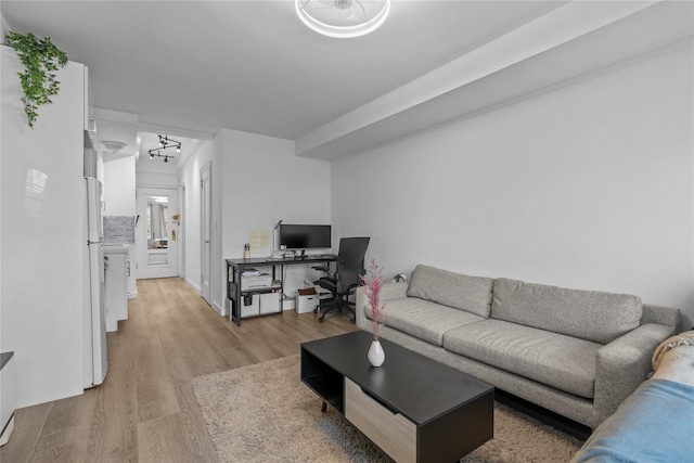 310 Riverside Dr Unit 1509, New York Manhattan, NY 10025 - living room featuring light wood finished floors and a desk
