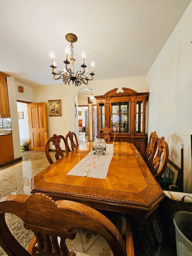 1725 W 4th St, Brooklyn, NY 11223 - dining space featuring arched walkways and a chandelier