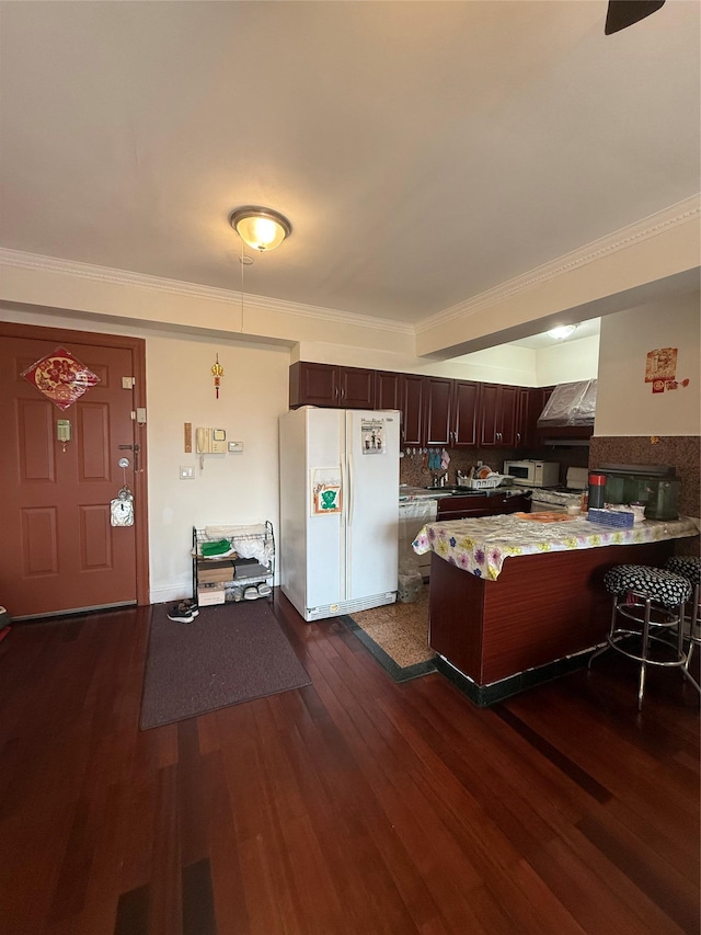41-05 College Point Blvd Unit 3Fl, Flushing, NY 11355 - kitchen with white appliances, a peninsula, custom range hood, tasteful backsplash, and dark wood finished floors