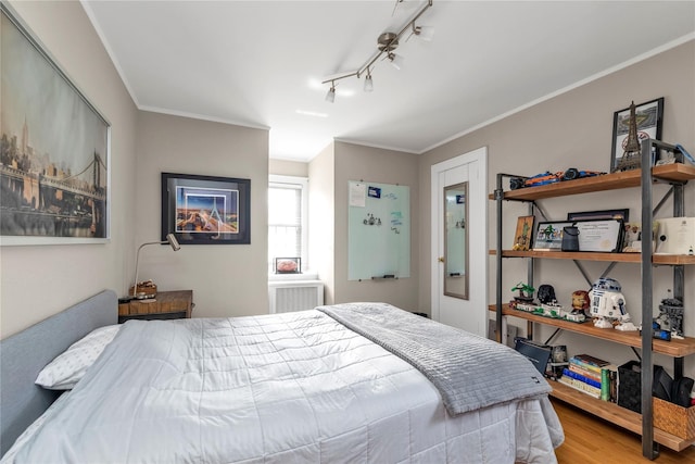45 Henry St, Merrick, NY 11566 - bedroom with wood finished floors and ornamental molding
