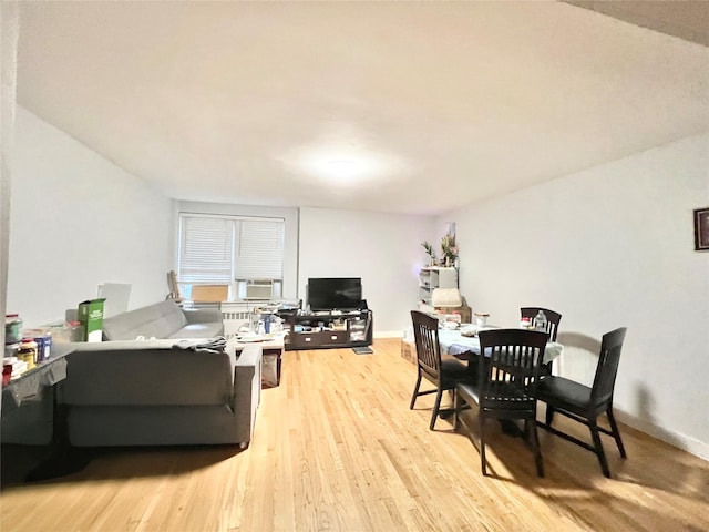 134-39 Blossom Ave Unit 1E, Flushing, NY 11354 - dining room featuring light wood-style flooring and cooling unit