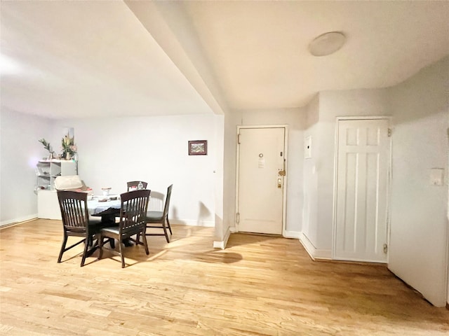 134-39 Blossom Ave Unit 1E, Flushing, NY 11354 - dining area with light wood-style flooring and baseboards