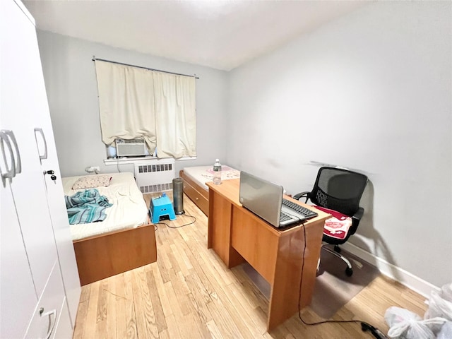 134-39 Blossom Ave Unit 1E, Flushing, NY 11354 - office space with radiator, light wood-style floors, and baseboards